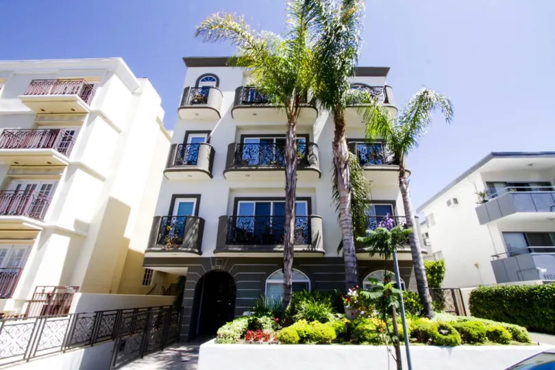 A large raised planted in front of the Bellagio Villas condos