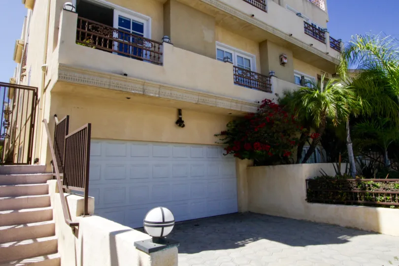 Garage door leads to Brentwood Mayfield private parking