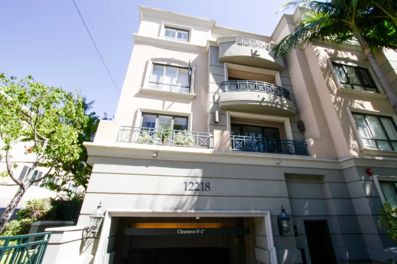Rounded and square balconies extend from Brentwood Park