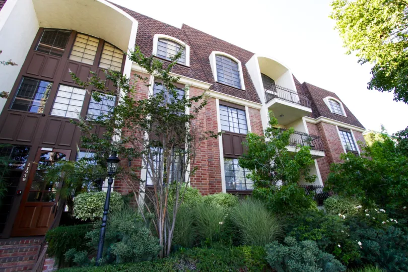 Balconies extend from the front of each level of the Brentwood Place condos