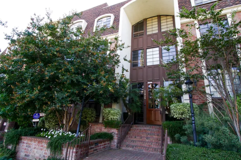 Lush and mature landscape surround the Brentwood Place building