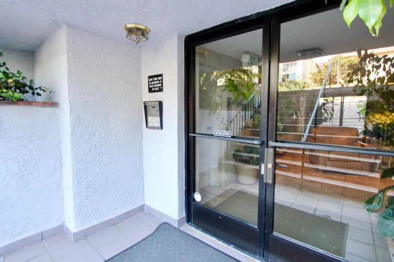 Glassy entrance of Brentwood Royale, Brentwood, California
