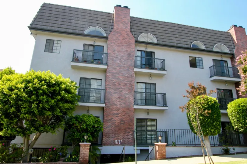 Brick chimney at 11737 at the Brentwood Royale on a sunny dya