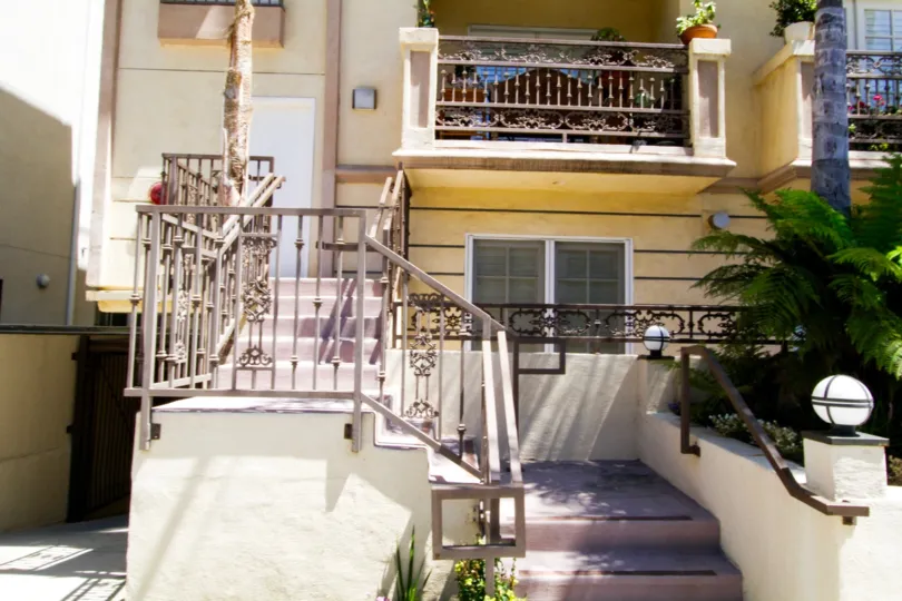 Stairs lead up to a side entrance of Brentwood View