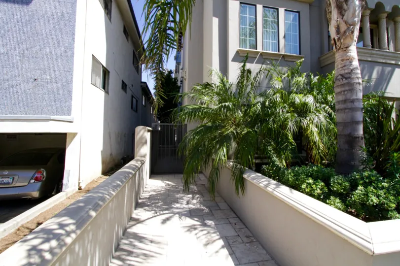 Sidewalk to side entrance of Casa Bella Villas
