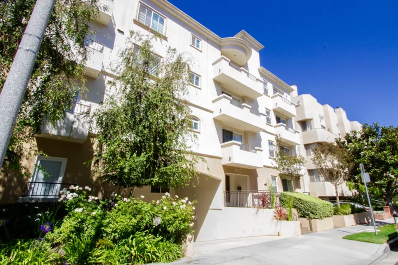 Sidewalk showing landscaped grounds of Chateau Des Montagnes Condos