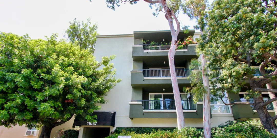 Balconies and trees in front of Coral Tree, Brentwood, California