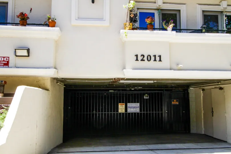 Gated parking entrance to Del Cielo