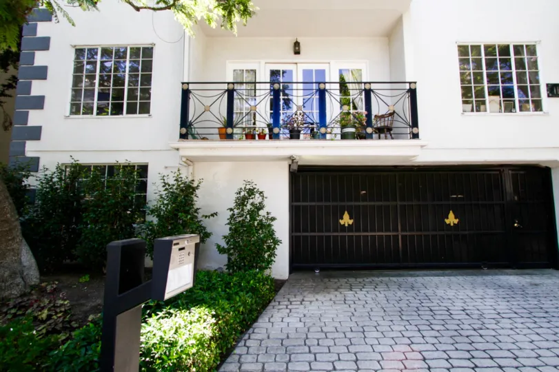 Cobblestones lead to a gated entrance to Fleur De Lis Brentwood