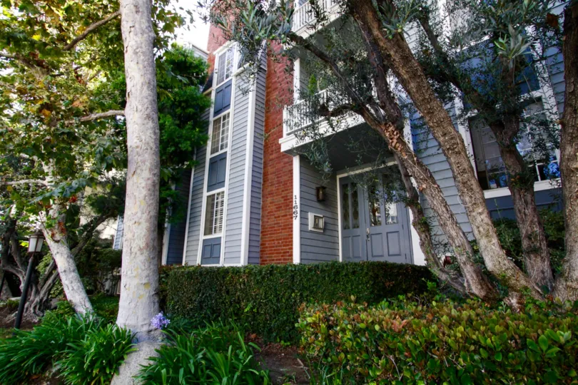 Lushly landscaped grounds surround Gorham Regency