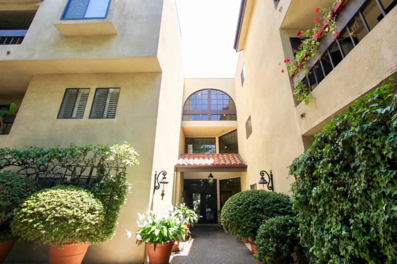 Outside the Le Provencal community in Brentwood, California on a sunny day.