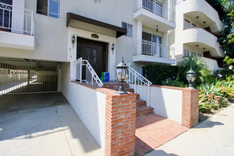 The brick steps and front entrance of the Manor House, Brentwood California