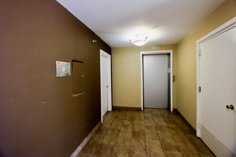 A nice white door for an apartment complex in Brentwood.