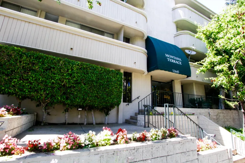 Raised planters line the walkways to the Montana Terrace entrance