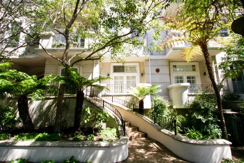Stairs lead to the front entrance of Montana Villas