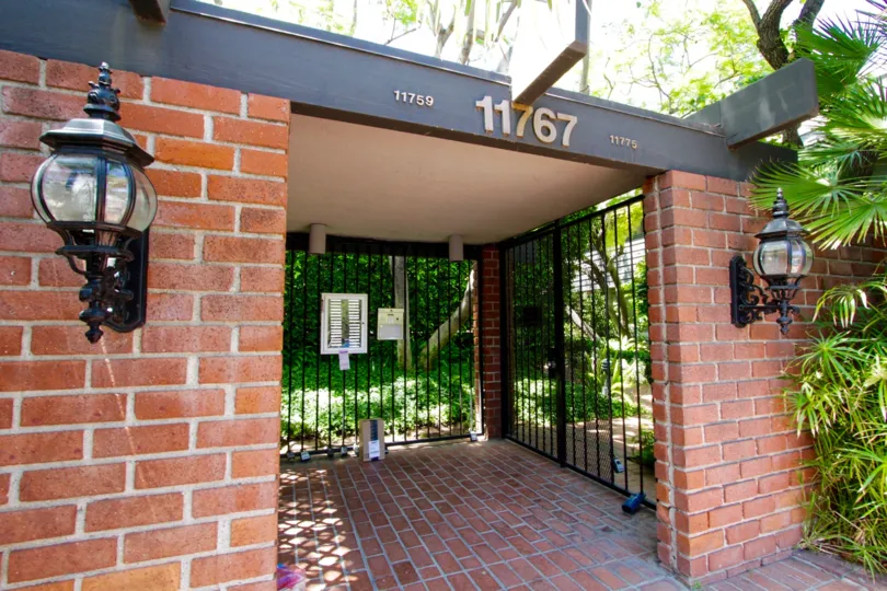 Exterior covered entry to Sunset Colony