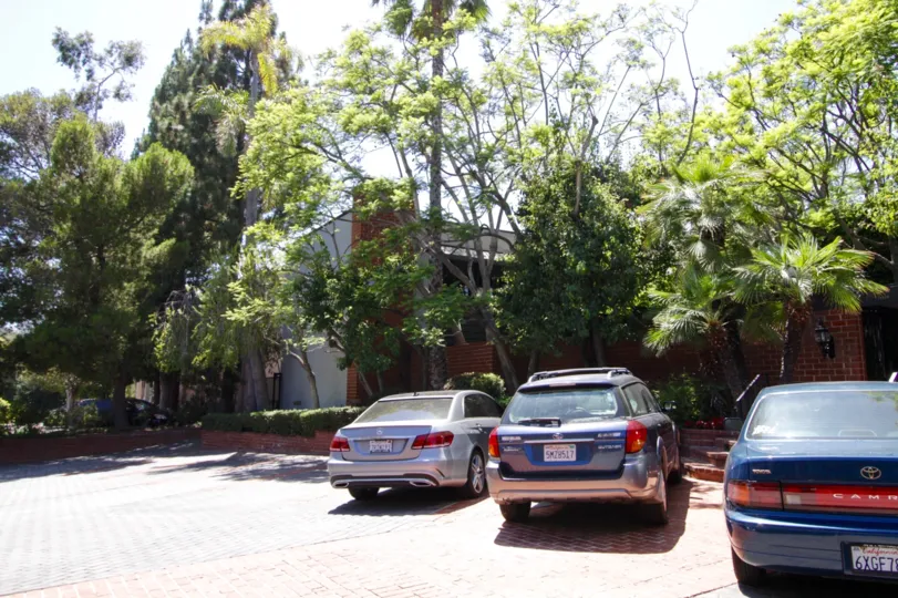 Street parking in front of the Sunset Colony complex