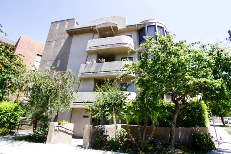 Lush landscape fills the front planters of Sunset Granville