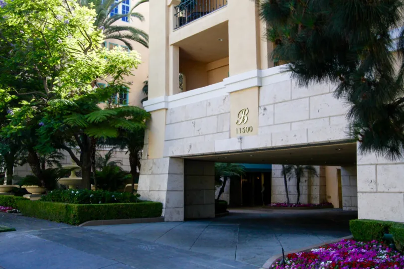 A grand porte coche entrance at the Brentwood condos
