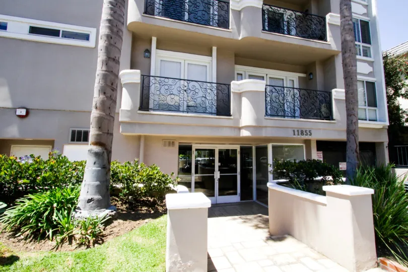 Glass door entrance to the Villa Cezanne condos