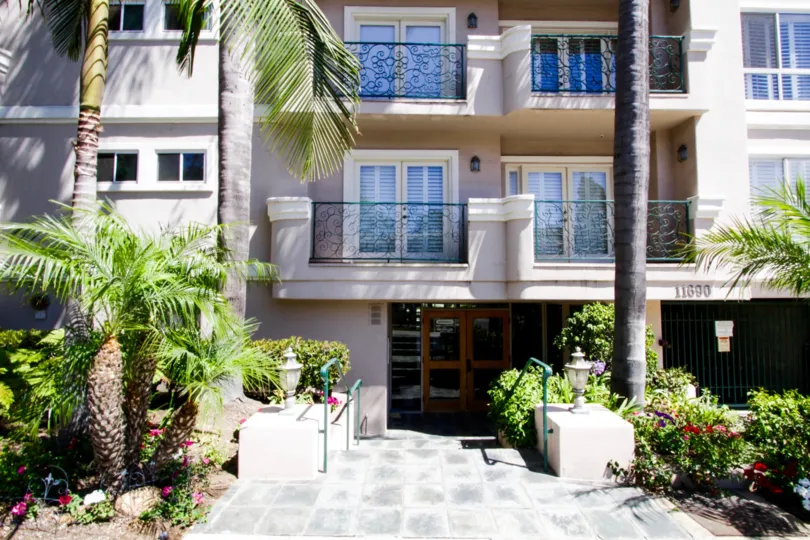Stairs leading to the double door entry of the Villa Monet condos