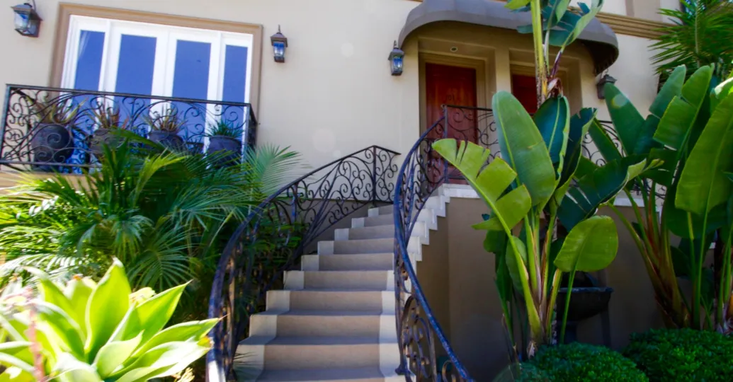 Wrought Iron railing lines the stairs to Villa Montana III condos