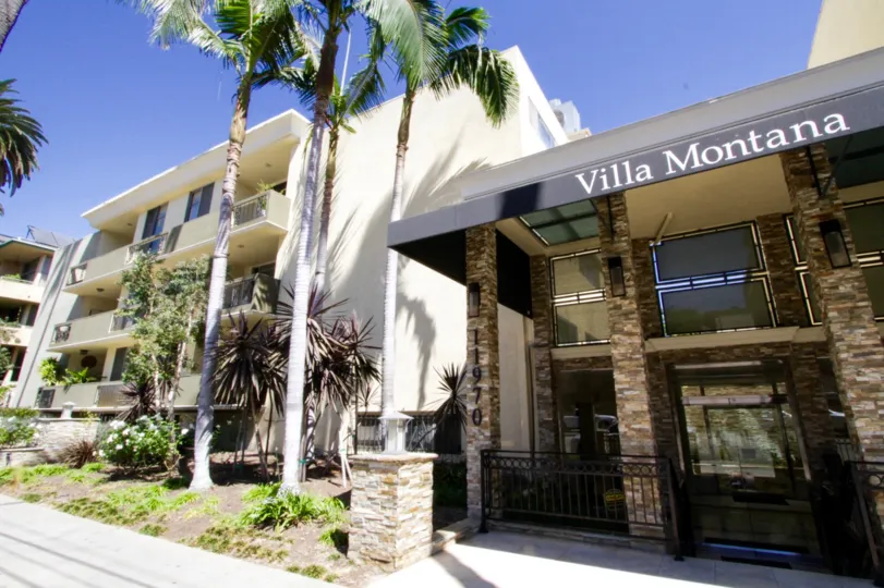 Glass wall entrance to the Villa Montana Condos