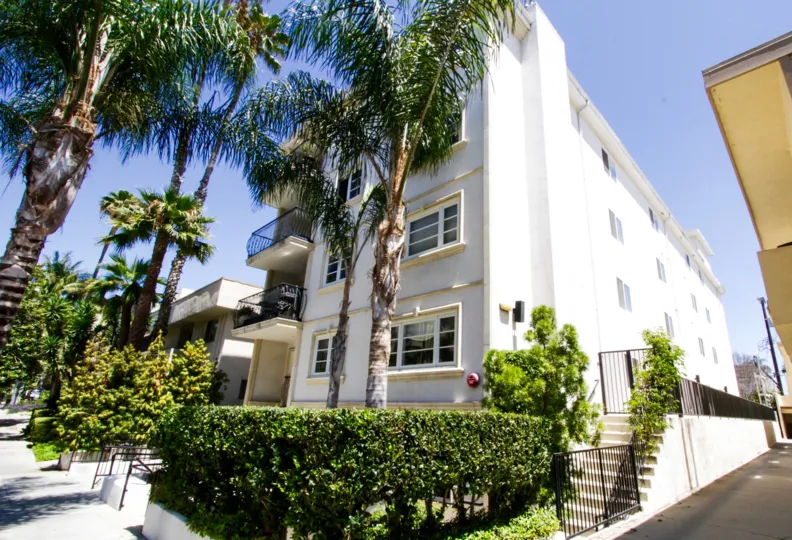 Lush landscaping covers the Villa Trocadero entrance