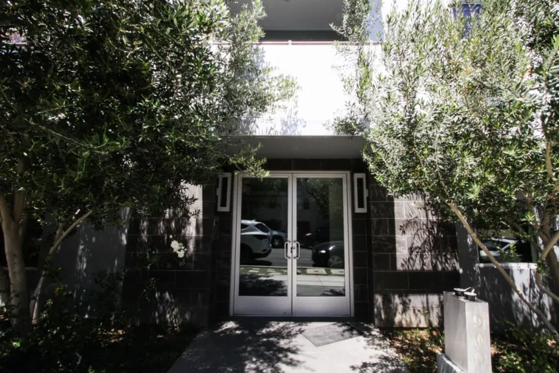 Double glass doors lead to the Westgate Dorothy condos
