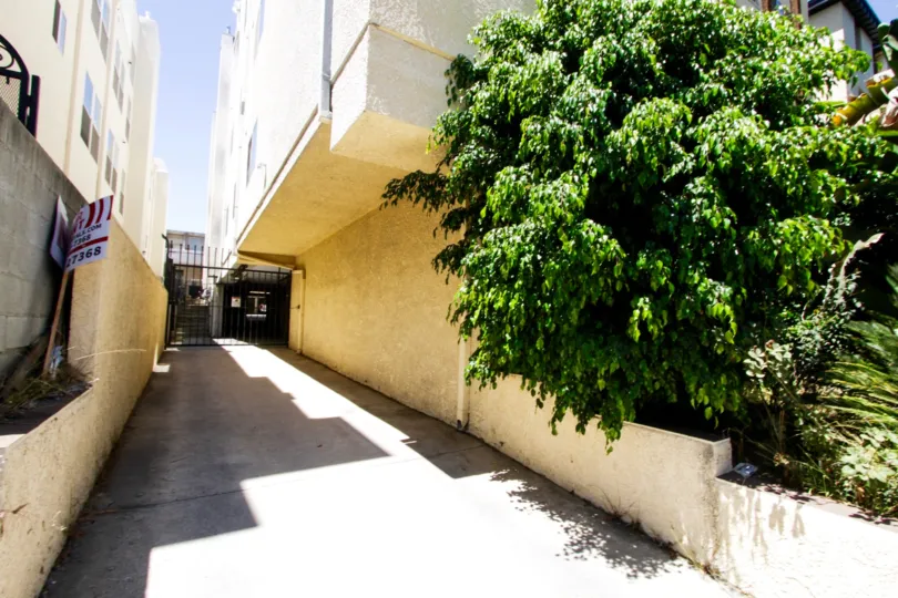 Gated parking entrance to White Palace condos