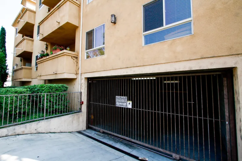 The gate into the parking area of 1515 Grismer Ave