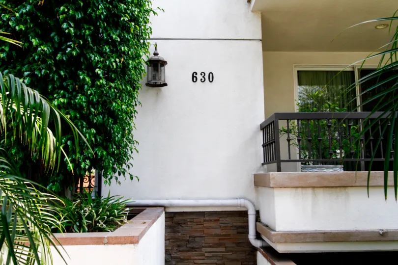 The address on the building at 630 E Olive Ave
