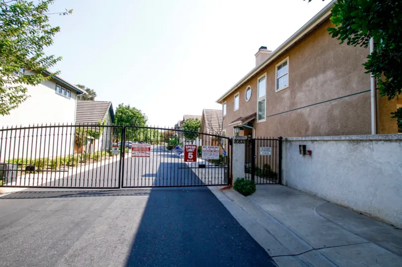 The gate to allow access into 20832 Valerio St