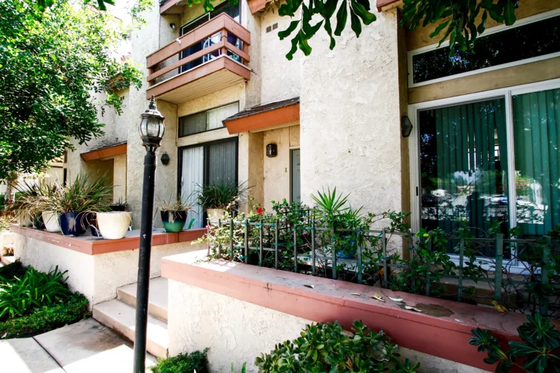 The landscaping seen around 21054 Parthenia St