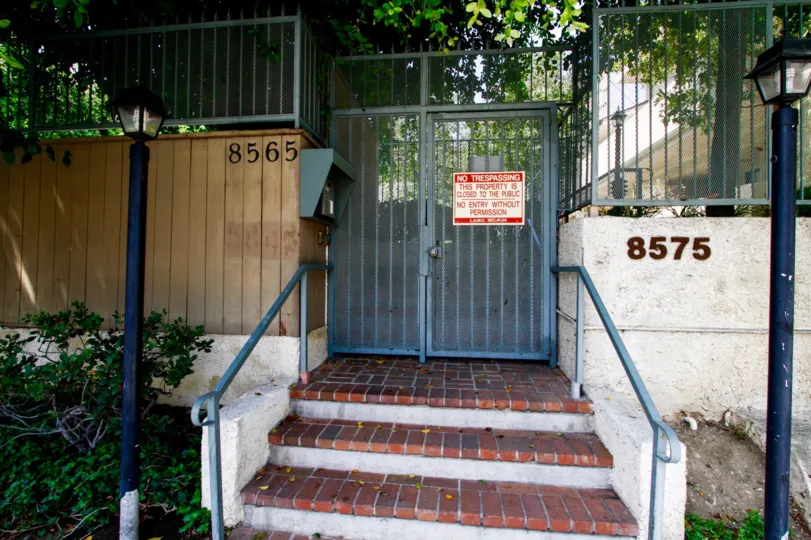 The address written beside the gate entering into Bryant Place
