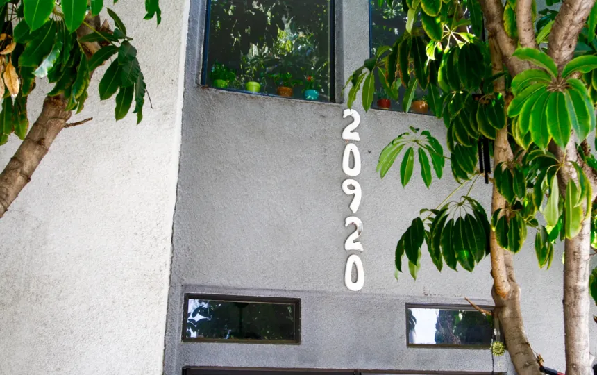 The address for Contempo Gardens written on the building