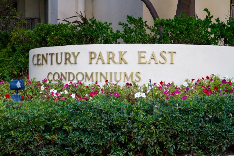 In gold letters on a raised planter is the Century Park East marquee