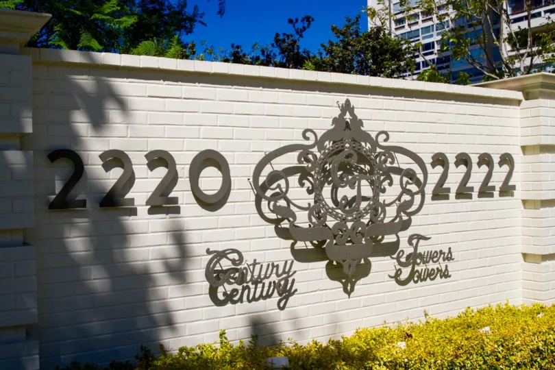 Century Tower address marquee mounted on a brick wall