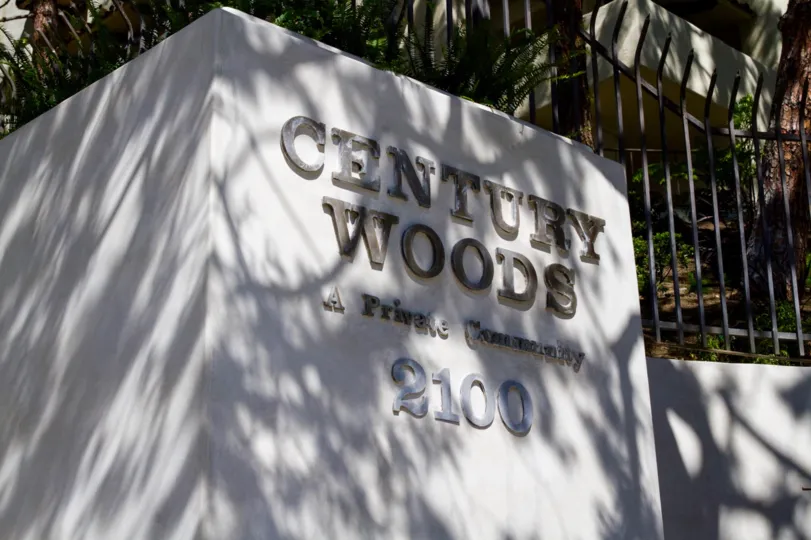 Century Woods marquee near the entrance to the community