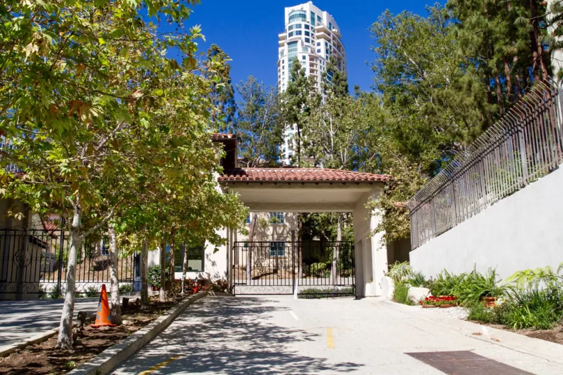 The gated entry to Century Woods