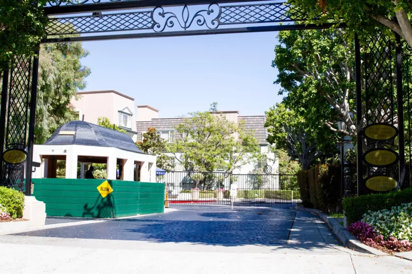 A large gated entrance to the condo community of Le Parc