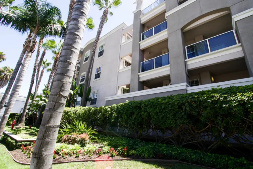 Walkway to the front entry of 1500 Ocean with planters on both sides