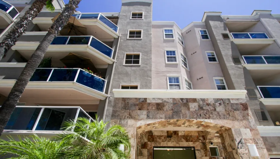 Front of 1500 Ocean is stone tile on first floor and stucco on upper floors