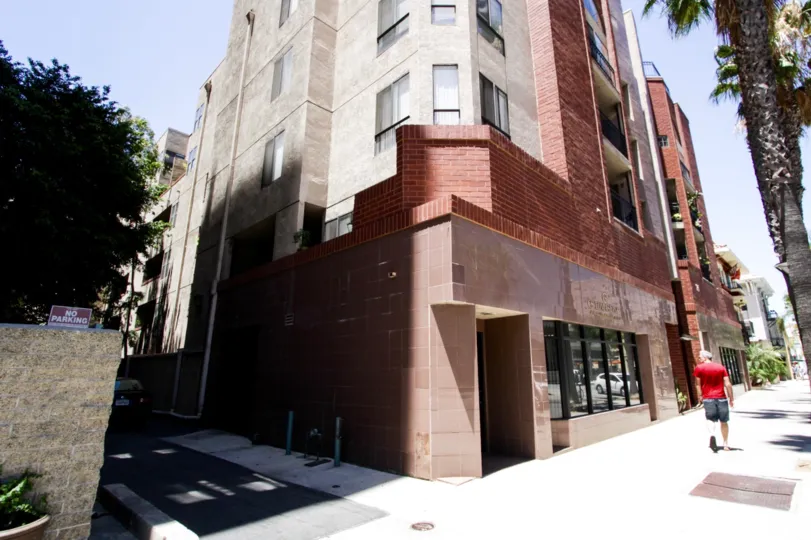 Street entry to 35 Linden lower level covered with shiny tile