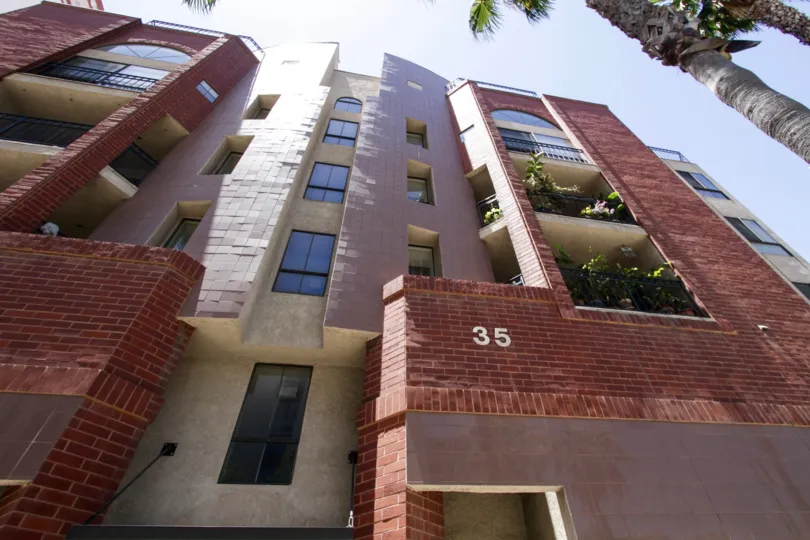 Balconies are recessed into 35 Linden with black metal railings