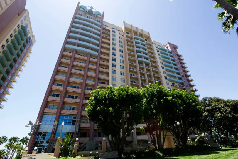 Upper floors of Aqua have blue balconies extending over the front of the building