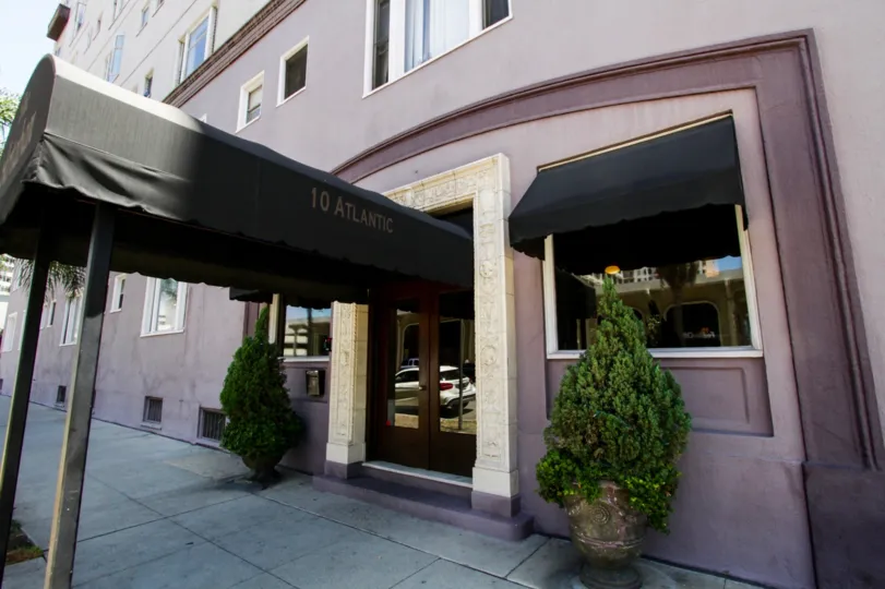 A canopy extends from the front door of Artaban to the street