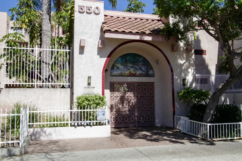 Ornate metal doors block the entry to Genesis