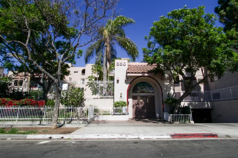 View of the entrance from the street in front of Genesis