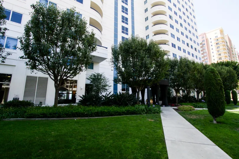 Entrance to Harbor Place Tower down a sidewalk